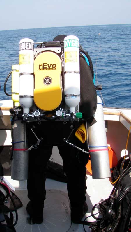 Diver in his rEvo rebreather unit gets ready to splash.  Dive Hatteras photo.